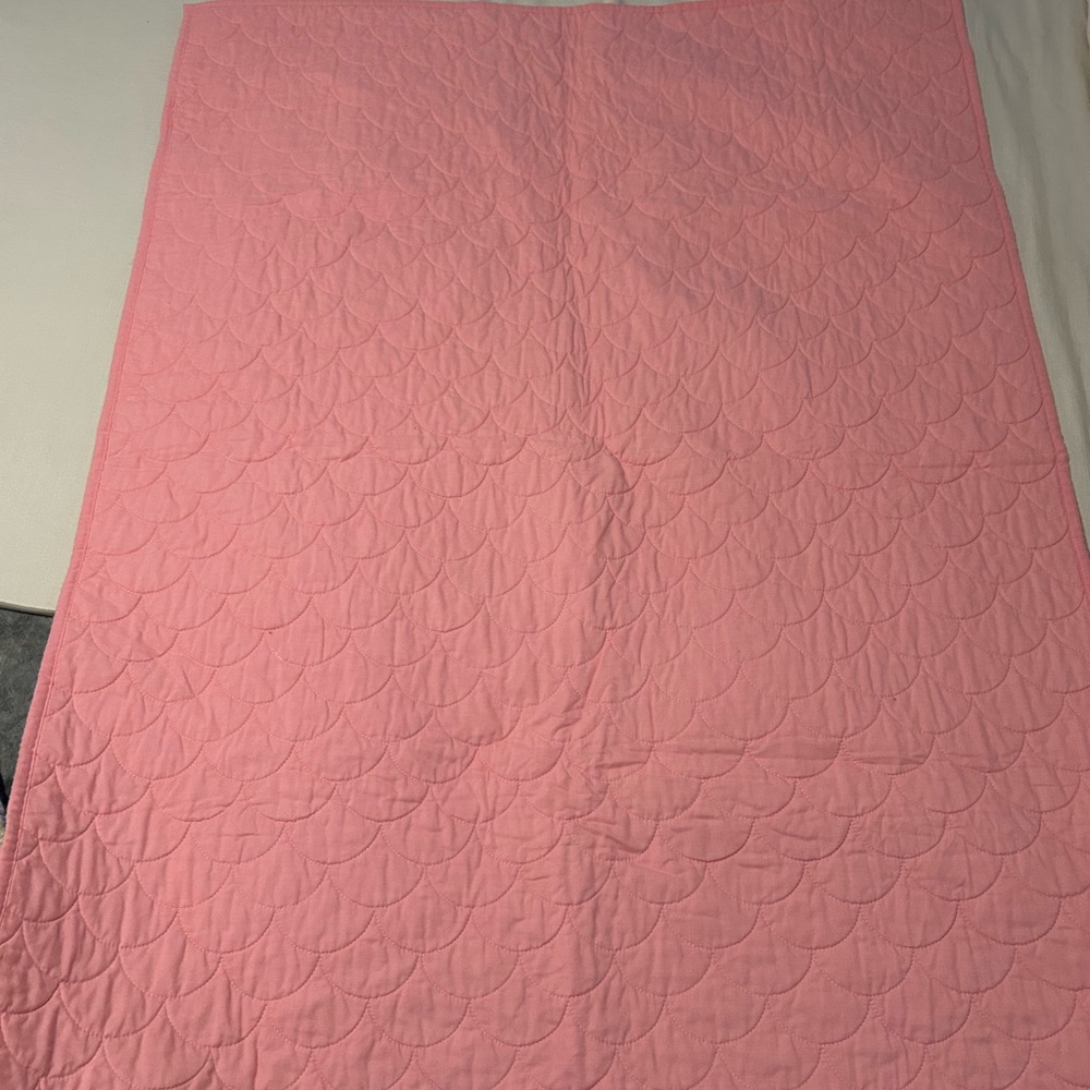 Pink pottery barn crib quilt